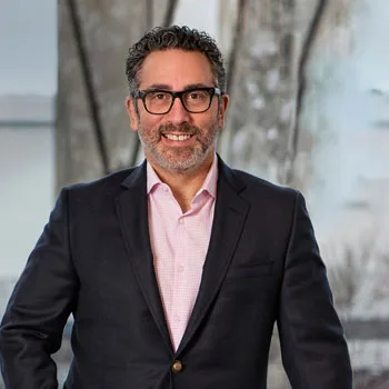 Mario Greco showing a luxury Chicago property to clients